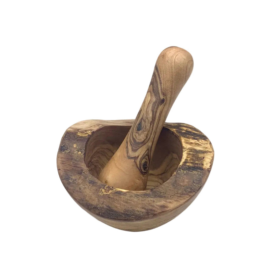 A handcrafted wooden mortar and pestle set made from olive wood, featuring natural dark and light grain patterns, photographed on a white surface with a light gray background.