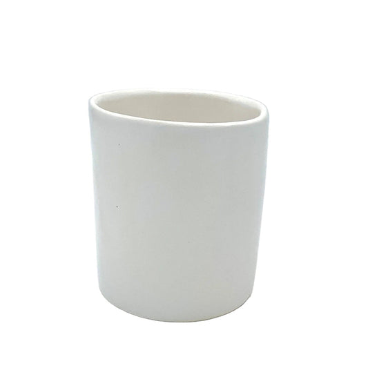 white ceramic tumbler