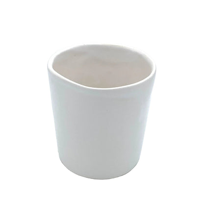 white ceramic tumbler