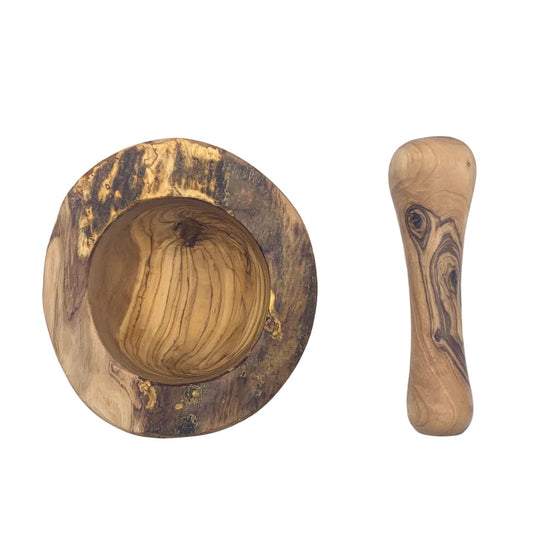 A handcrafted wooden mortar and pestle set made from olive wood, showing natural grain patterns in shades of tan, brown, and dark brown, isolated on a white background.