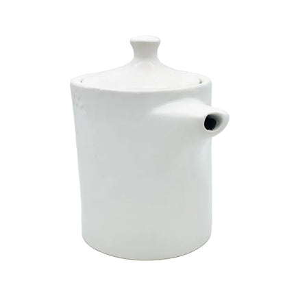 White handmade ceramic teapot