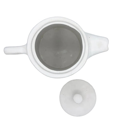 White handmade ceramic teapot