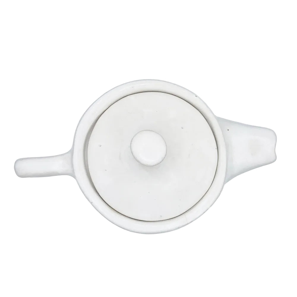 White handmade ceramic teapot