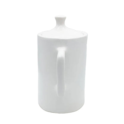 White handmade ceramic teapot